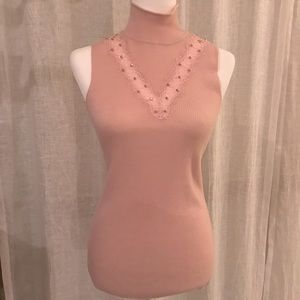 ELIE TAHARI Turtleneck top, light pink, with lace details.